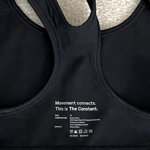 Black Xs - Movement connects. This is the constant. Sports bra. No padding. - Picture 3 of 3